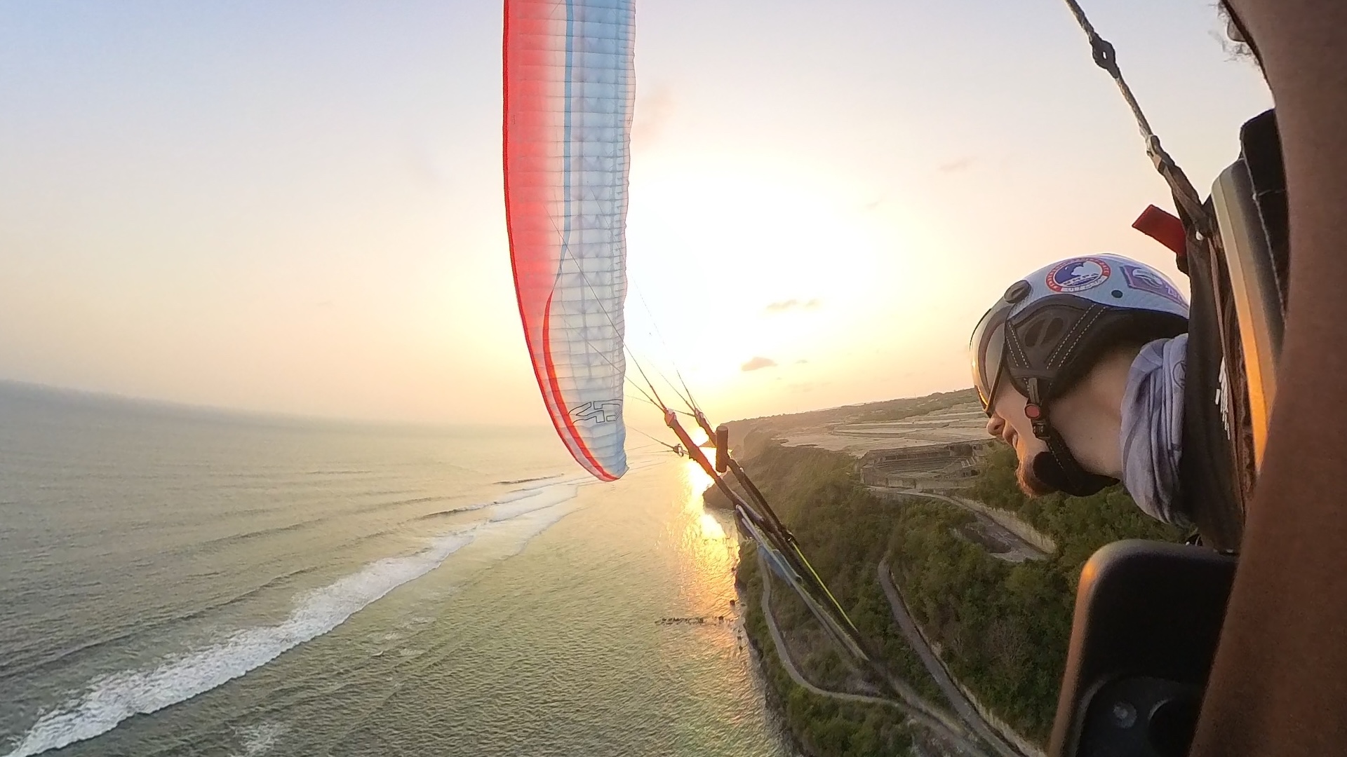 Video: Paragliding Along the Cliffs in Bali